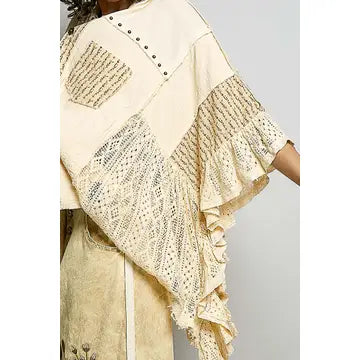 Crochet Lace Ruffle Gauze Shirt in Cream – close-up detail of open-weave crochet lace panel, stud embellishments, and layered ruffle sleeve trim