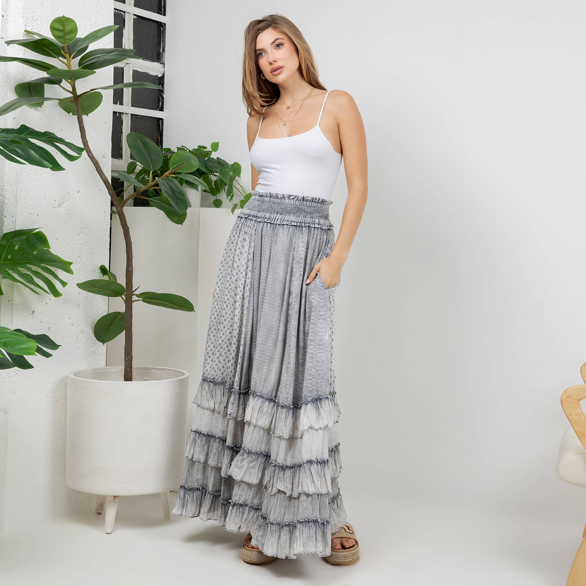 The Reverie Ruffled Tiered Maxi Skirt in Grey - full-length view highlighting tiered construction and flowing silhouette with pockets