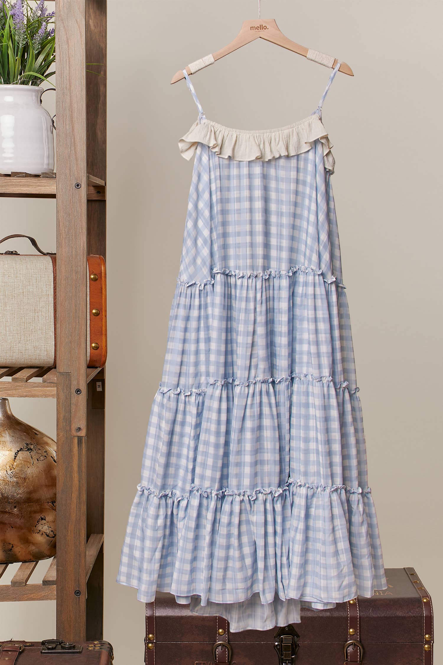 Blue ruffle dress back view - cascading ruffles and luxurious flowing fabric construction back view