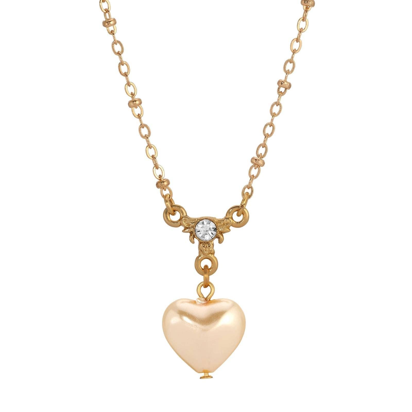 Pearl heart pendant necklace detail - vintage-inspired romantic necklace with puffed heart pearl and clear brilliant crystal on gold chain