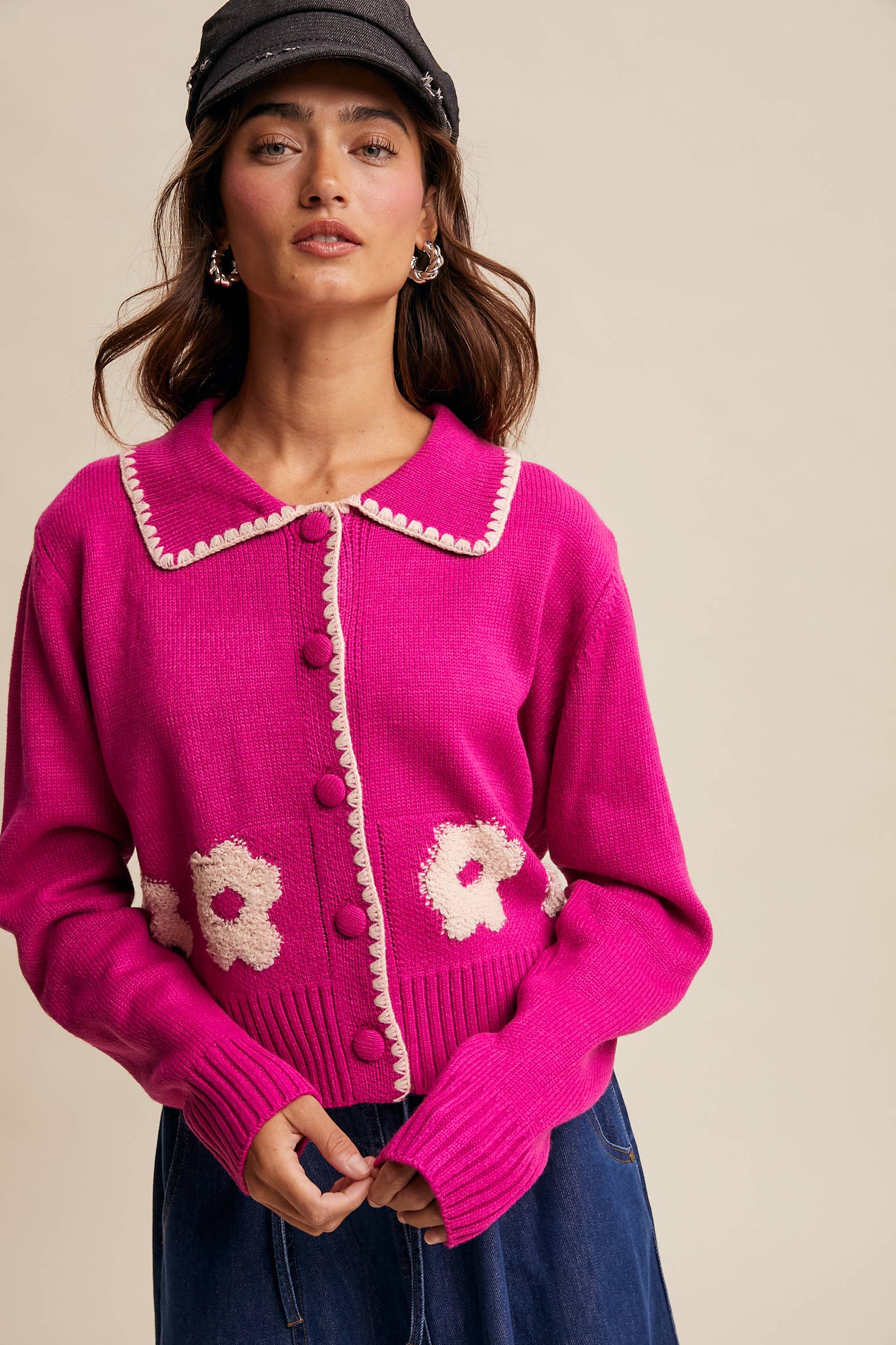Women’s floral collar knit cardigan with button-front design, soft textured fabric, and contrast flower-patterned collar — stylish layering sweater for everyday wear.