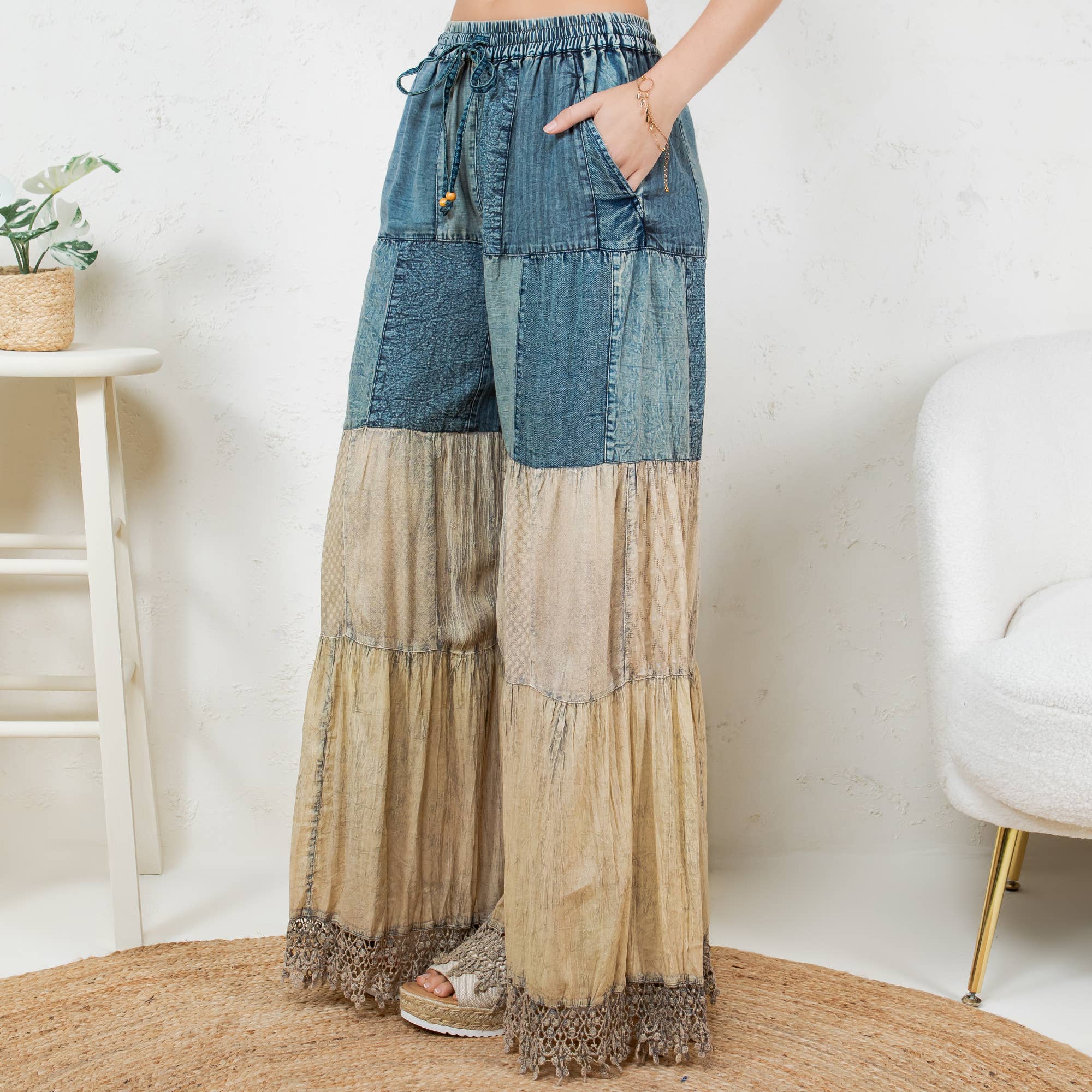 Patchwork pants side angle - full-length design showing sweater knit, rayon and lace fabric transitions