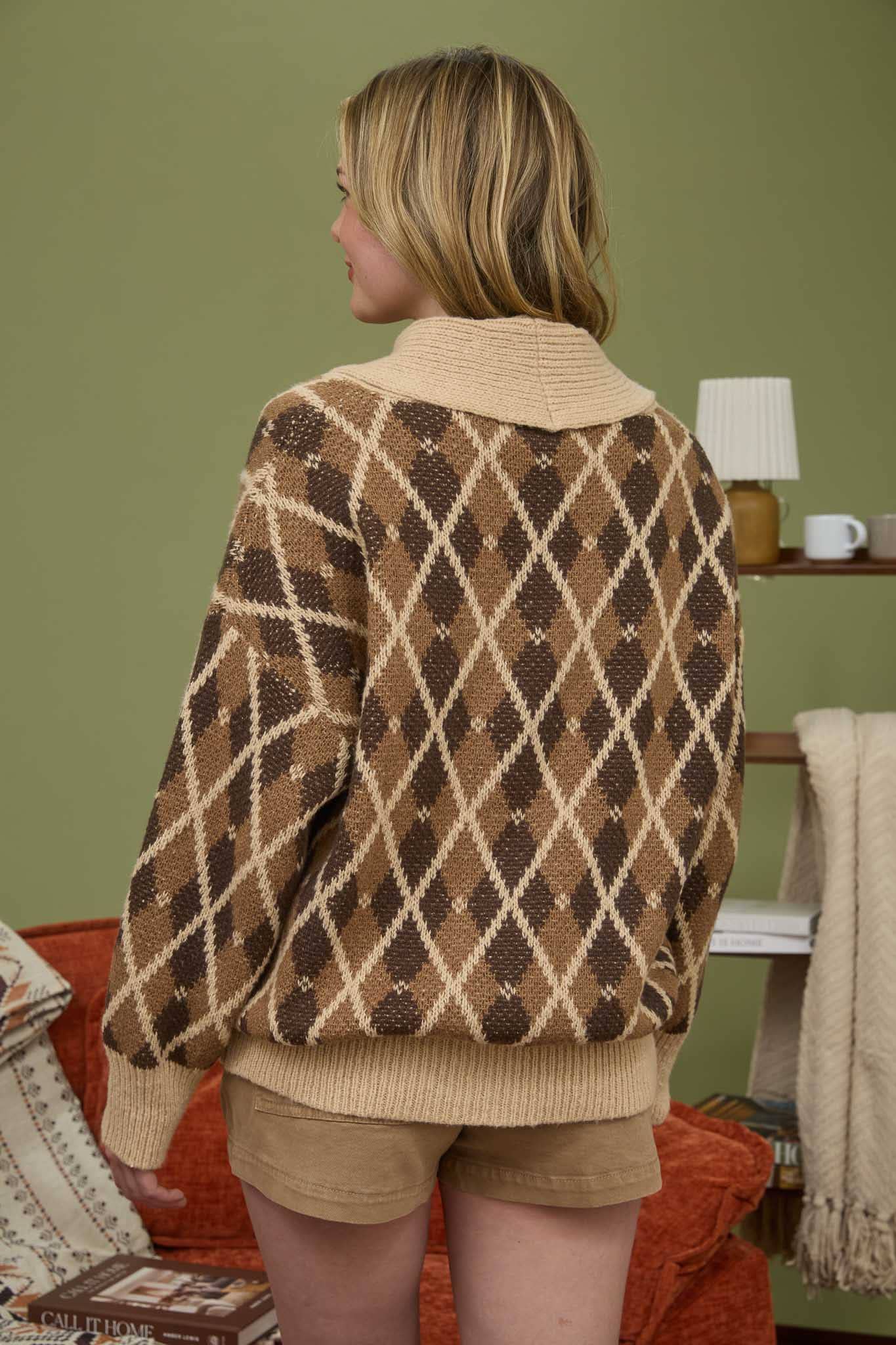Cozy up in the Heritage Argyle Cardigan a timeless knit featuring a tan and brown diamond pattern, ribbed shawl collar, and relaxed fit for effortless fall layering.