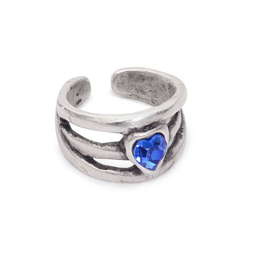 Silver open toe ring with a blue gemstone on a white background