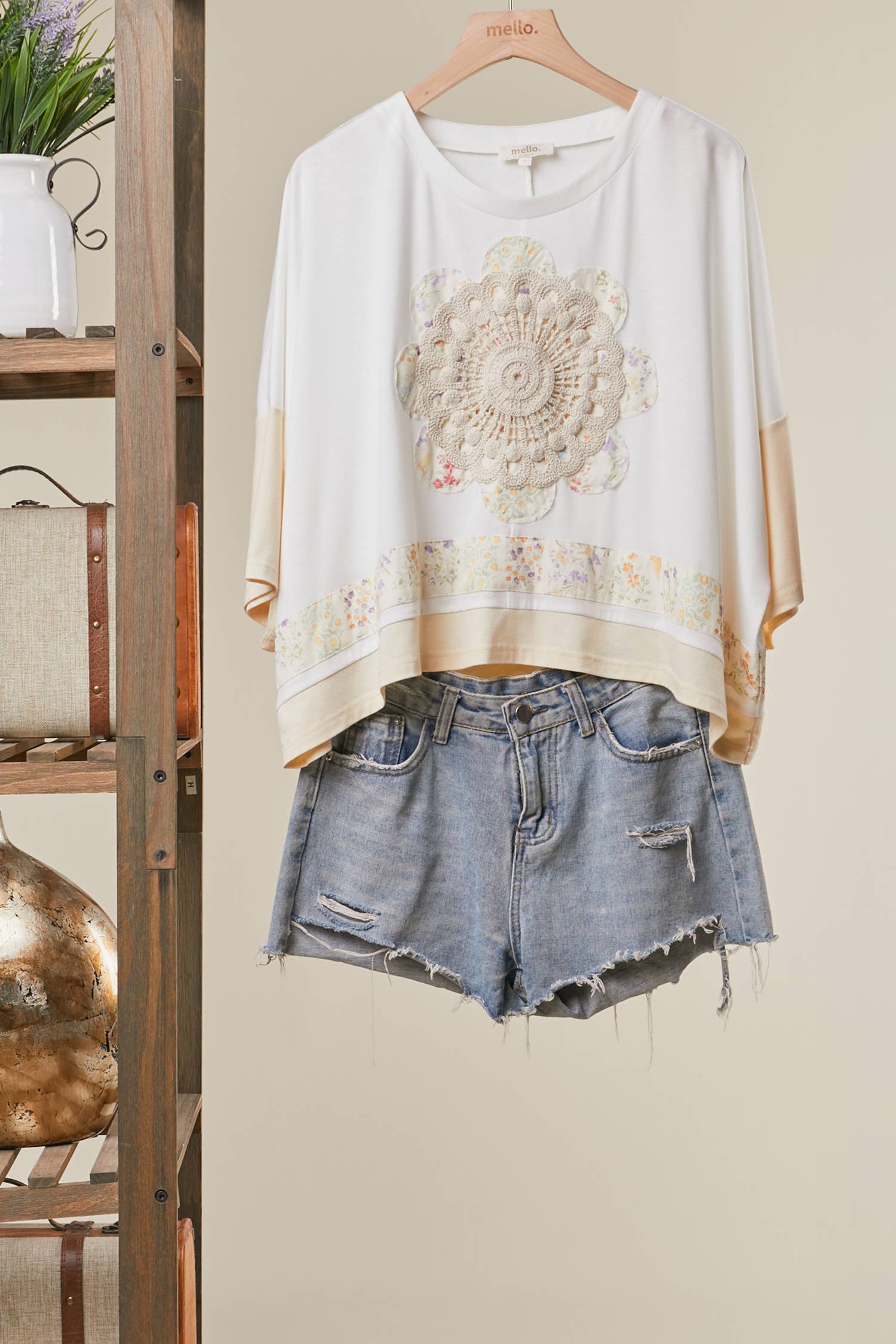 Romantic lace embroidered top - front view showing intricate lace detailing with round neck and short sleeves