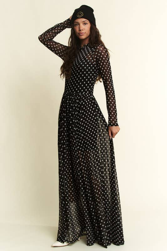 Black polka-dot mesh long-sleeve maxi dress with high neck and flowy, sheer overlay.
