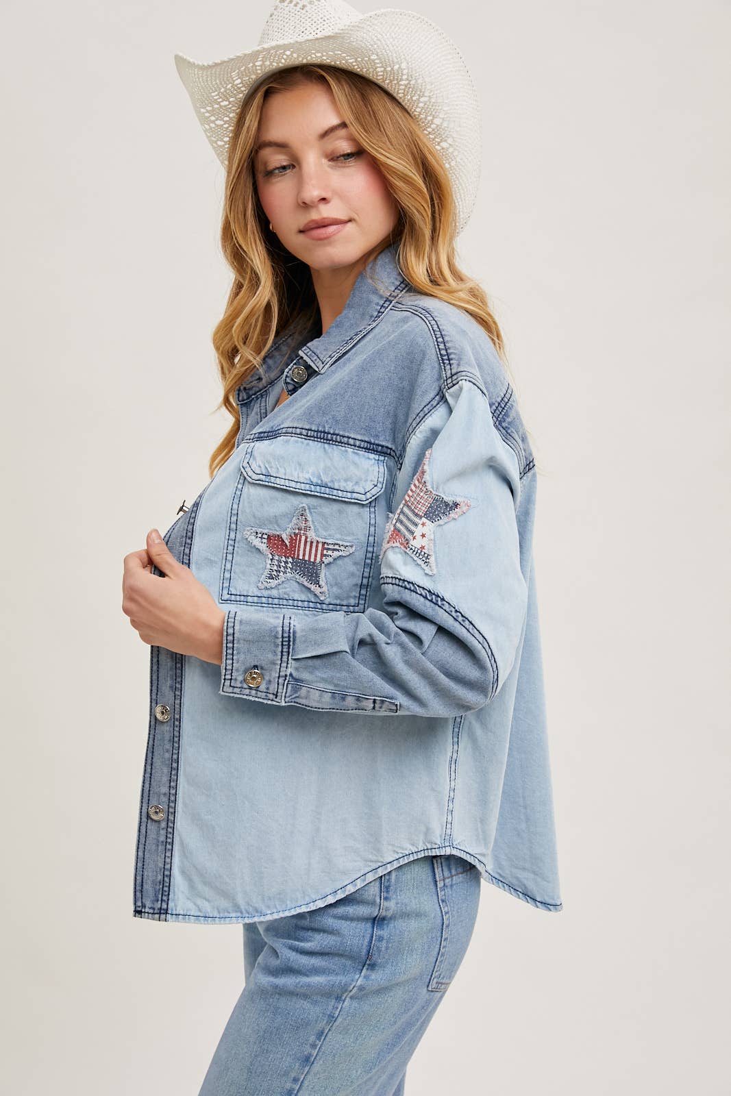 Two-tone denim button-down jacket featuring patriotic star appliqués on pocket and sleeve