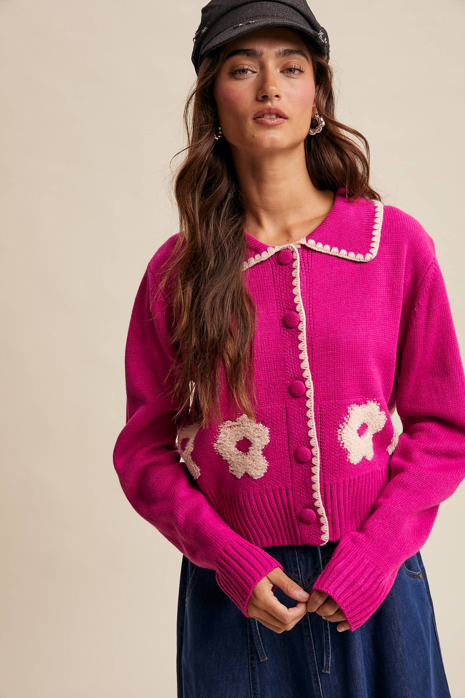Women’s floral collar knit cardigan with button-front design, soft textured fabric, and contrast flower-patterned collar — stylish layering sweater for everyday wear.