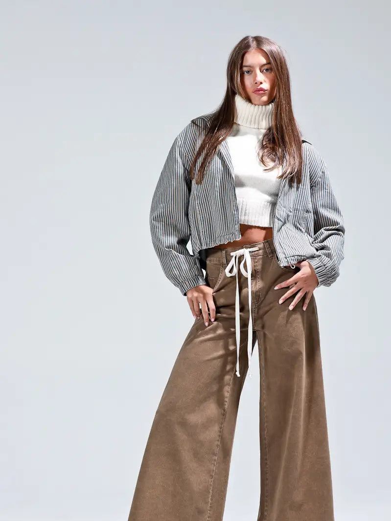 Front view, striped bomber + cream turtleneck + wide-leg brown pants