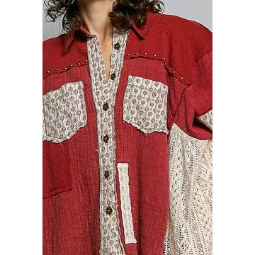 Crochet Lace Ruffle Gauze Shirt in Red – close-up detail of cream floral print patch pockets, stud embellishments, button placket, and open-weave crochet lace trim