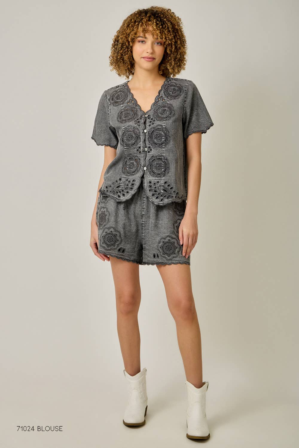 Full view Eyelet Embroidered Washed Tencel Shorts in Acid Black — thigh length with eyelet embroidery, scallop hem, and side pockets

