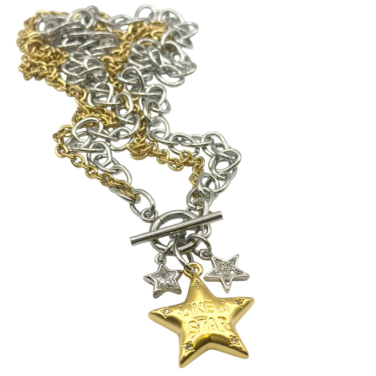 Necklace: Mixed-metal necklace with silver- and gold-tone chains, a toggle clasp, two small silver stars, and a gold star engraved “Like a Star.”

