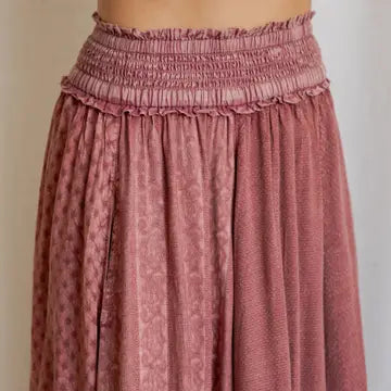 Garnet Artisan Panel Maxi Skirt - close-up of smocked waist and textured jacquard fabric in garnet
