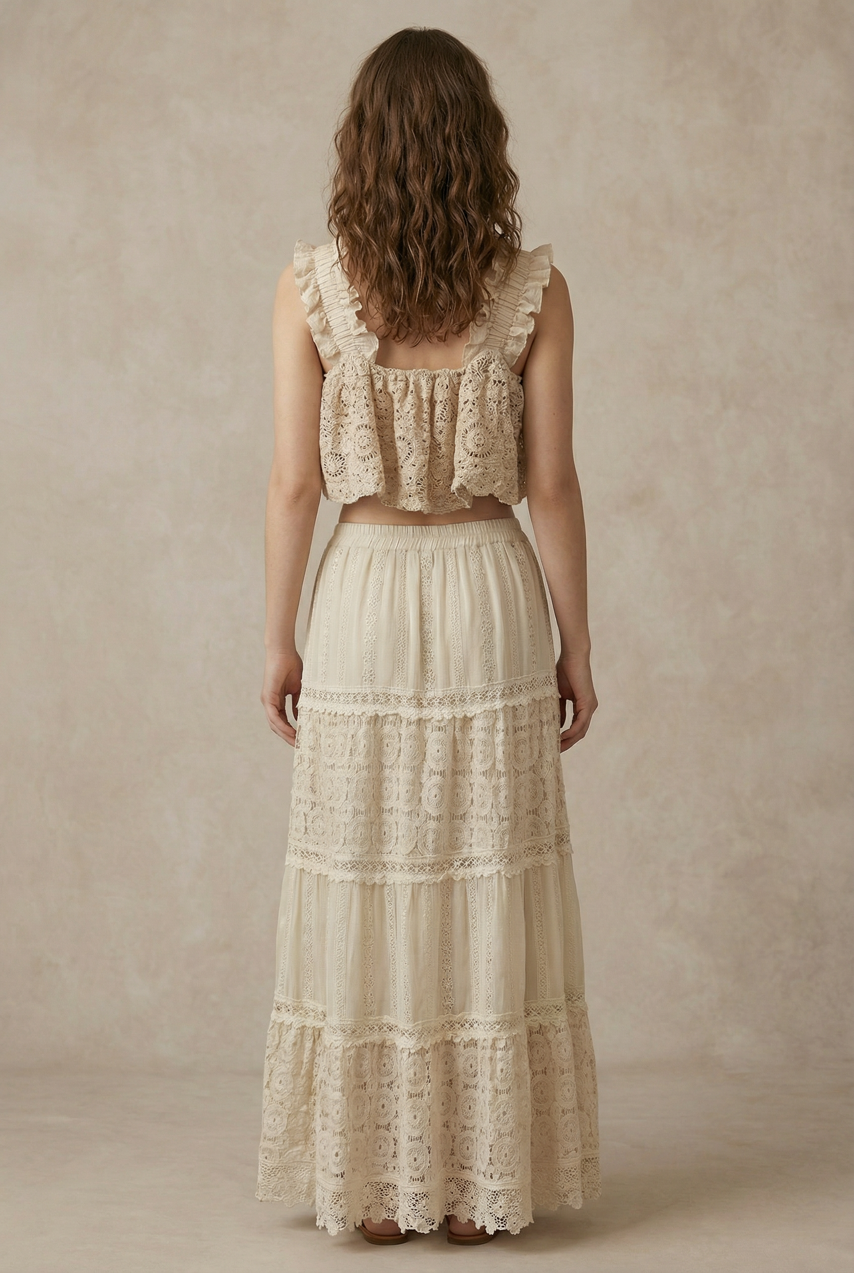 Lace crop top back view - charming button-down back with intricate bohemian lace construction