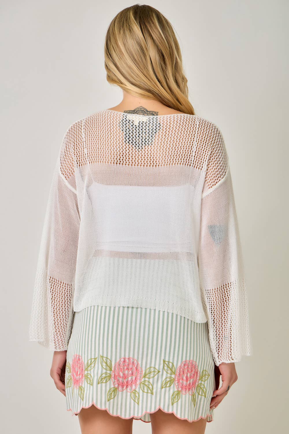 The Barely There Knit  in Ivory - back view of slouchy sweater design