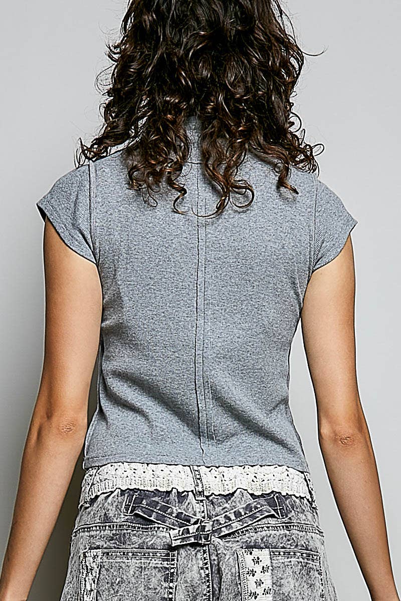 Back view of heather grey vintage wash mock neck rib knit top showing overlock stitch hem and slim rib knit fabric 