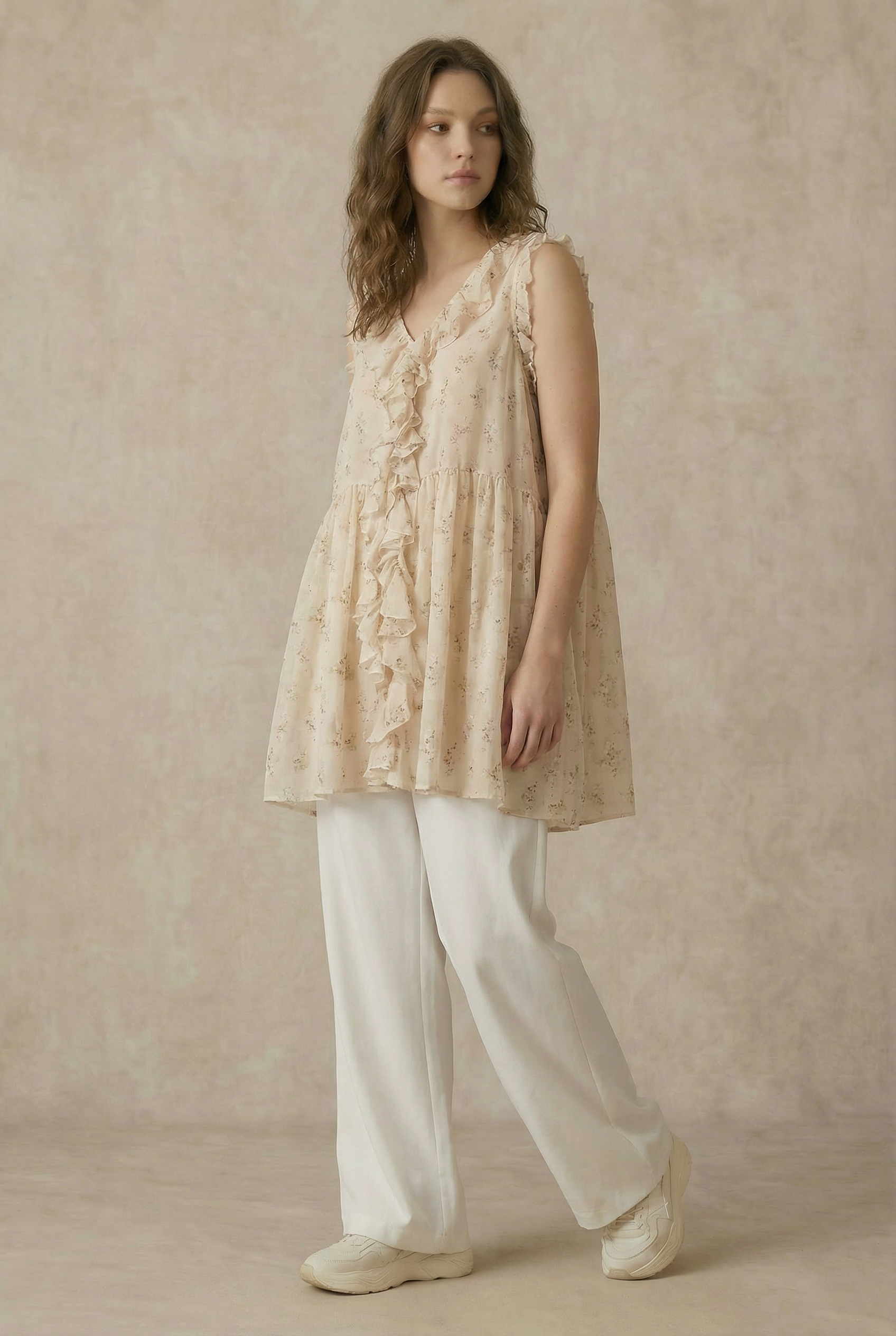 Enchanted Garden tunic styled - whimsical floral ruffled top with effortless boho-luxe elegance 

