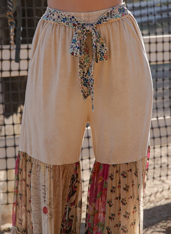 The Dreamer Tiered Wide Leg Pants - detail of mixed cotton knit and printed ruffle panels
