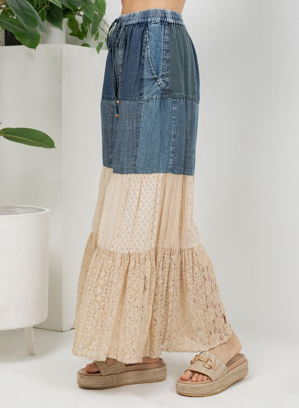 The Indigo & Lace Tiered Patchwork Pants side view showing artisan patchwork design and full length