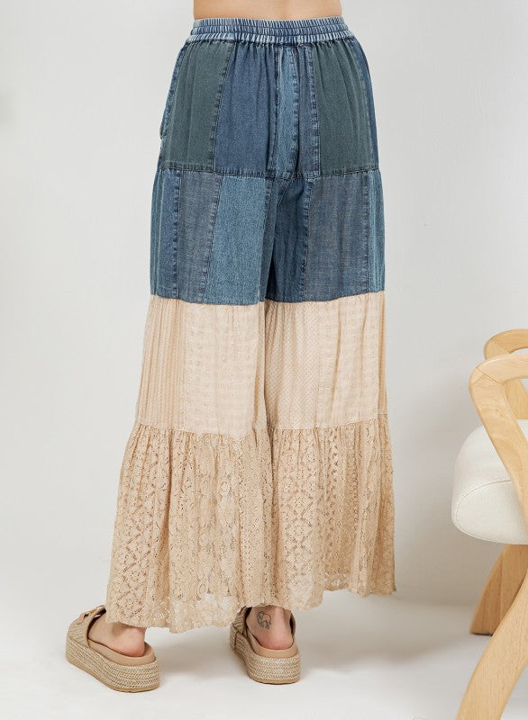 The Indigo & Lace Tiered Patchwork Pants back view showing artisan patchwork design and full length