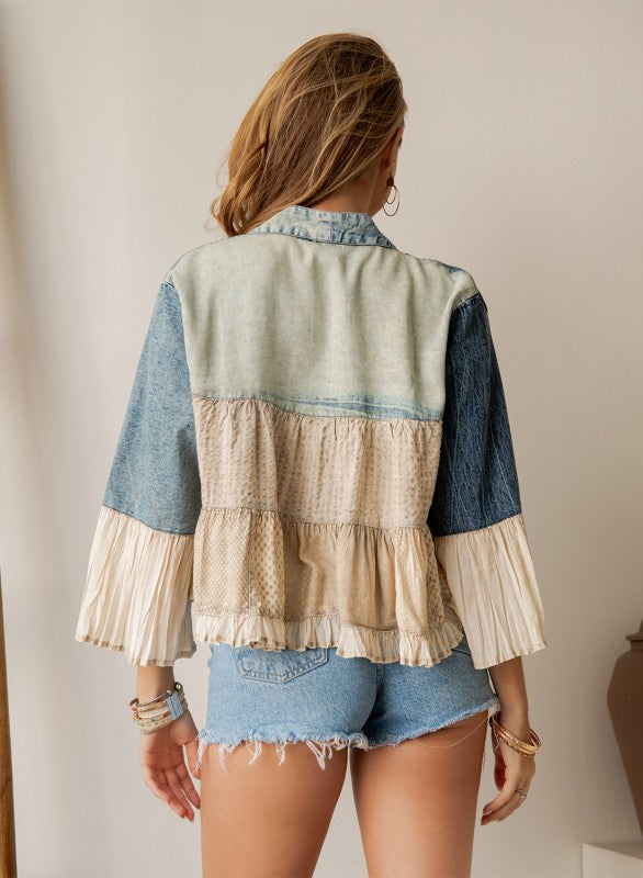 The Storyteller Embroidered Longline Shrug back view showing below-hip length and relaxed fit