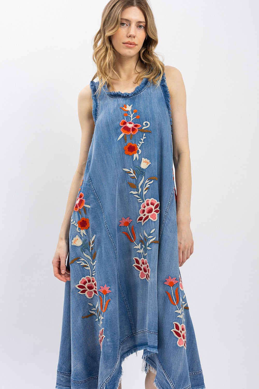 The Indigo Wildflower Dress - embroidered Tencel denim dress in indigo with floral details, front view