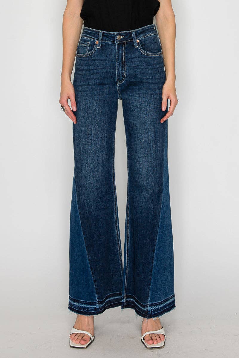 Flare jeans hem detail - unique polished hem treatment on dramatic long flare silhouette

