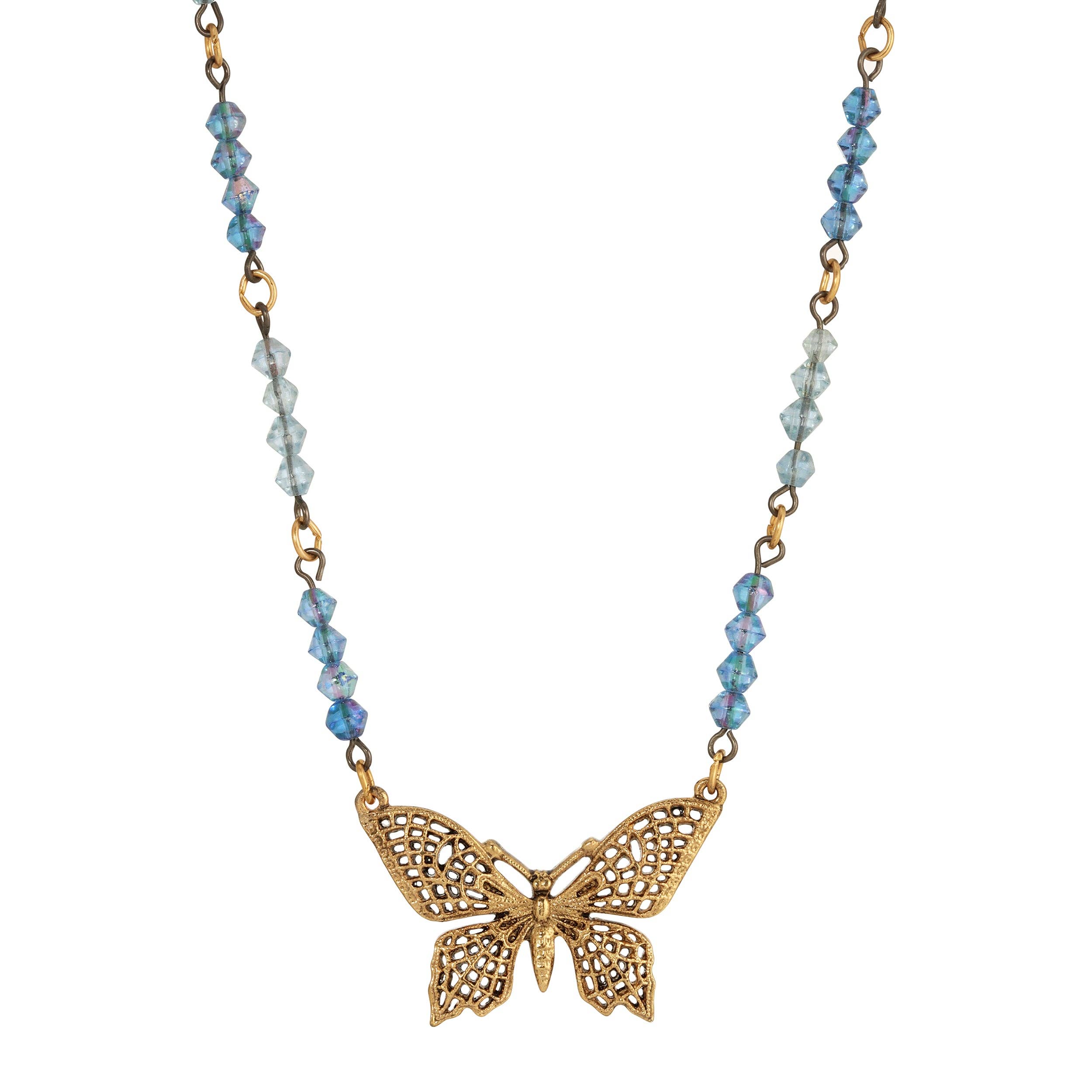 Sapphire crystal butterfly necklace detail - vintage-inspired ornate butterfly pendant with shimmering sapphire and light sapphire AB beads



