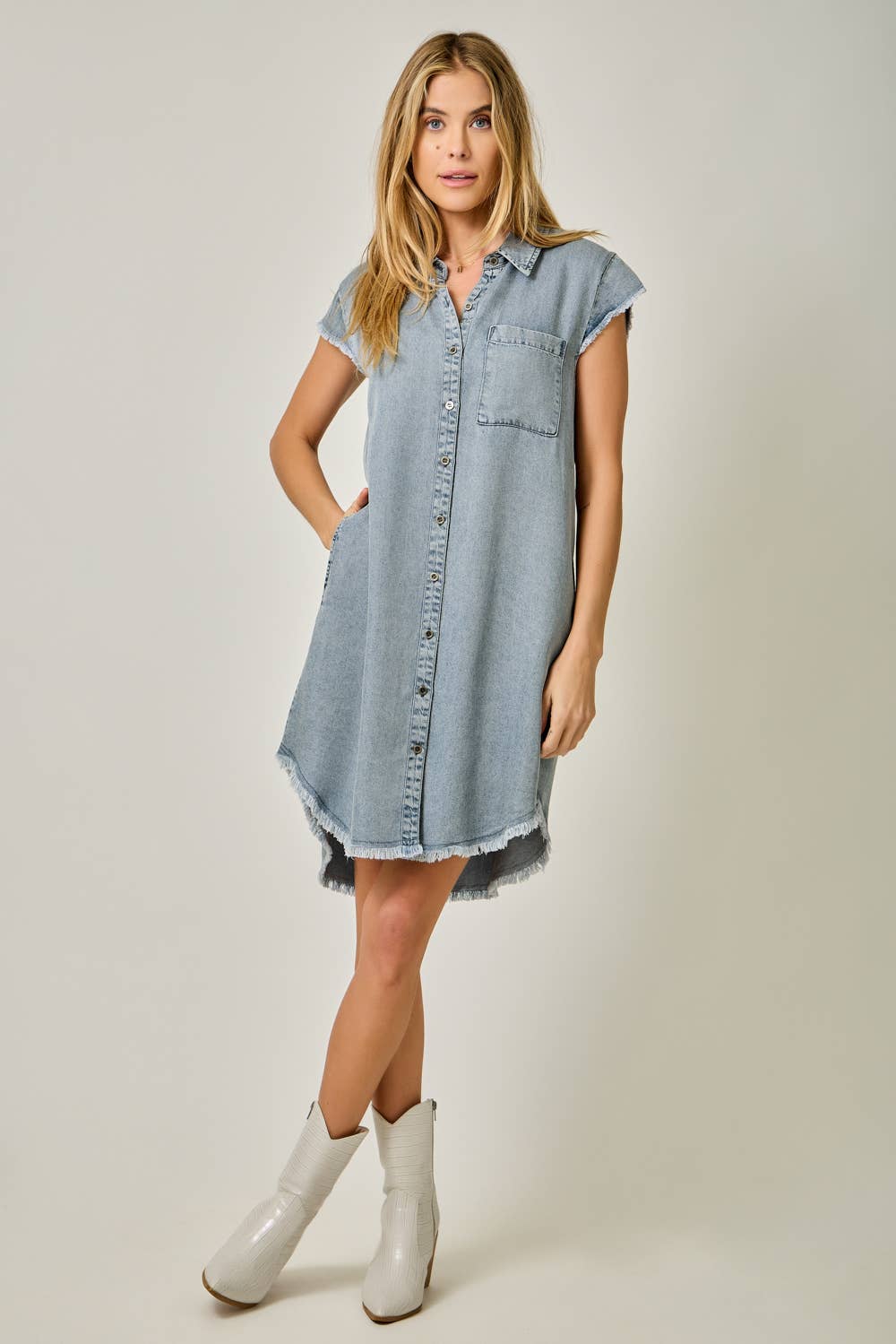 Fringe Hem Tencel Shirt Dress in Light Denim Blue — button-down front, flutter cap sleeves, fringed hi-lo hem, and side pockets

