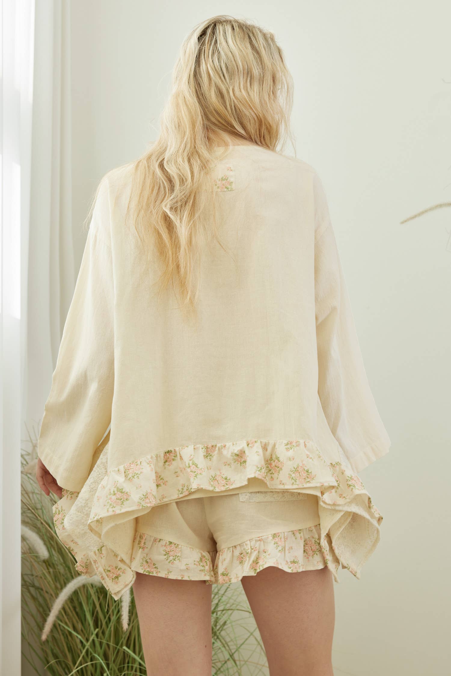 Back view Boho-luxe patchwork top styled - oversized flattering fit perfect for pairing with matching shorts or denim