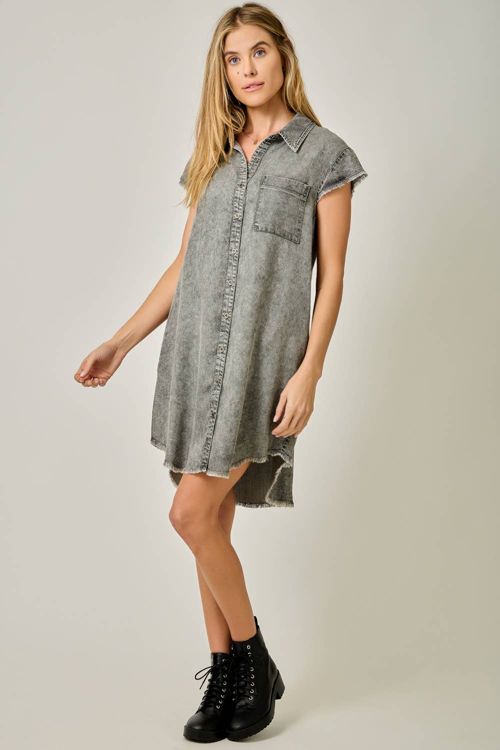 Fringe Hem Tencel Shirt Dress in Washed Black — button-down front, flutter cap sleeves, fringed hi-lo hem, and side pockets

