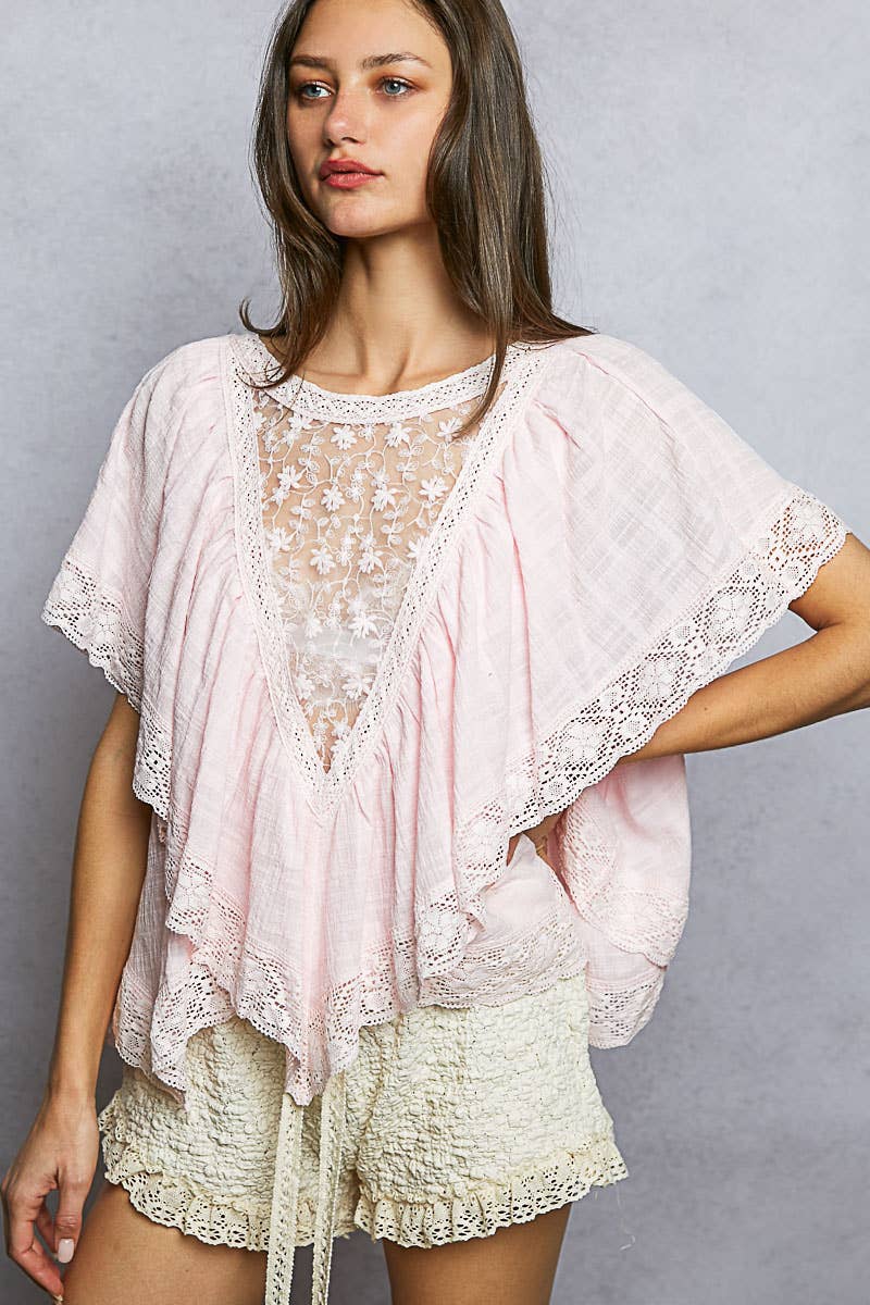 Reversible Embroidered Ruffle Top in Pink with sheer floral embroidered panel, V-ruffle layers, lace trim, and relaxed woven fit