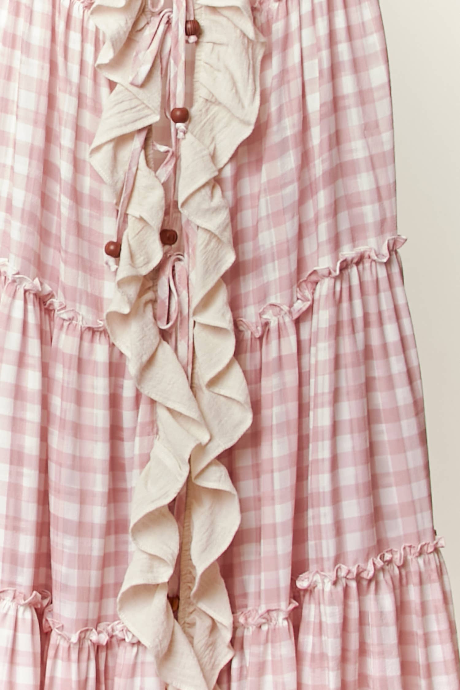 Pink ruffle cardigan dress detail - cascading ruffles and premium quality fabric construction