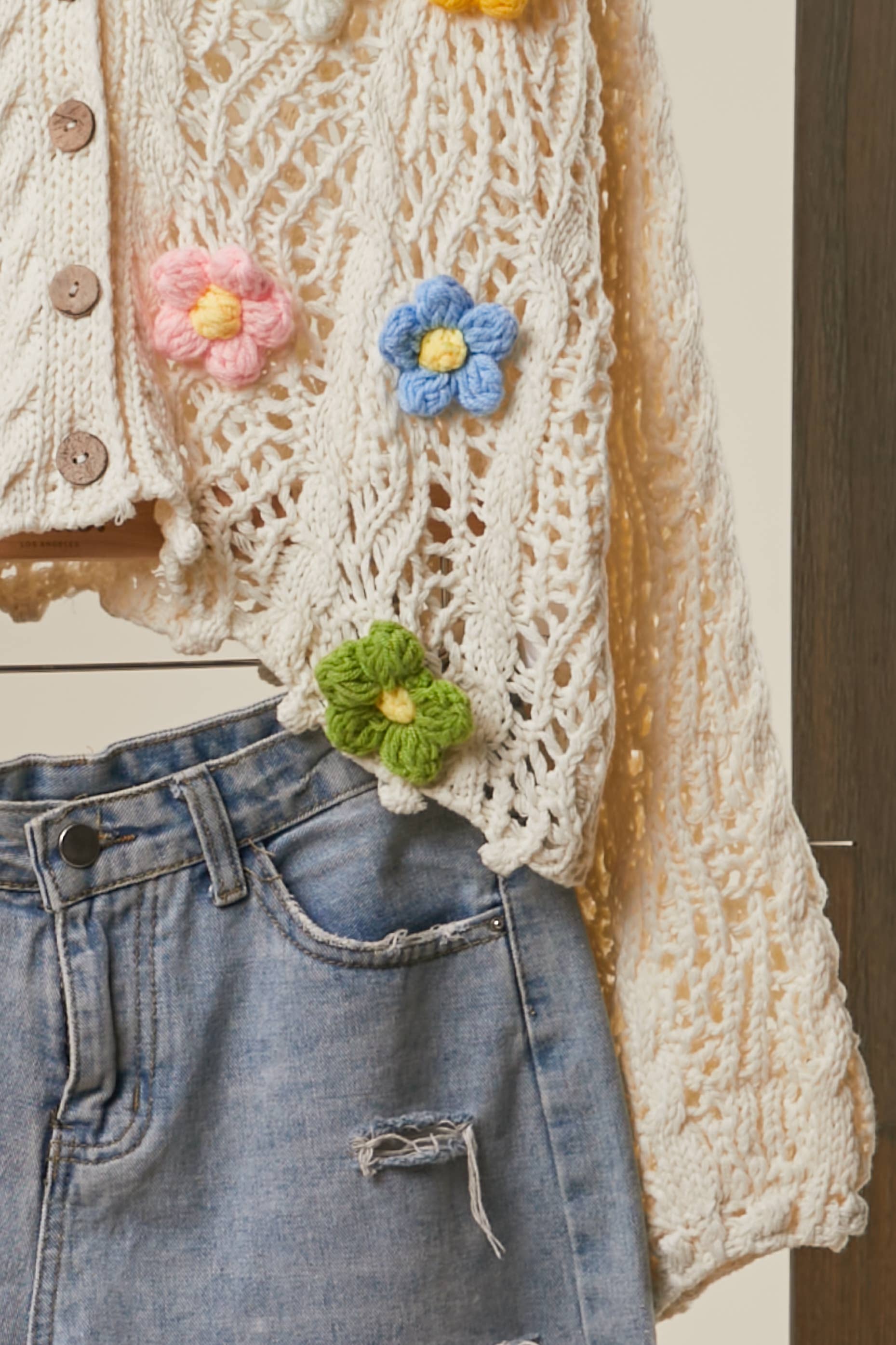 Floral crochet cardigan texture detail - meticulous handcrafted stitching and vintage charm