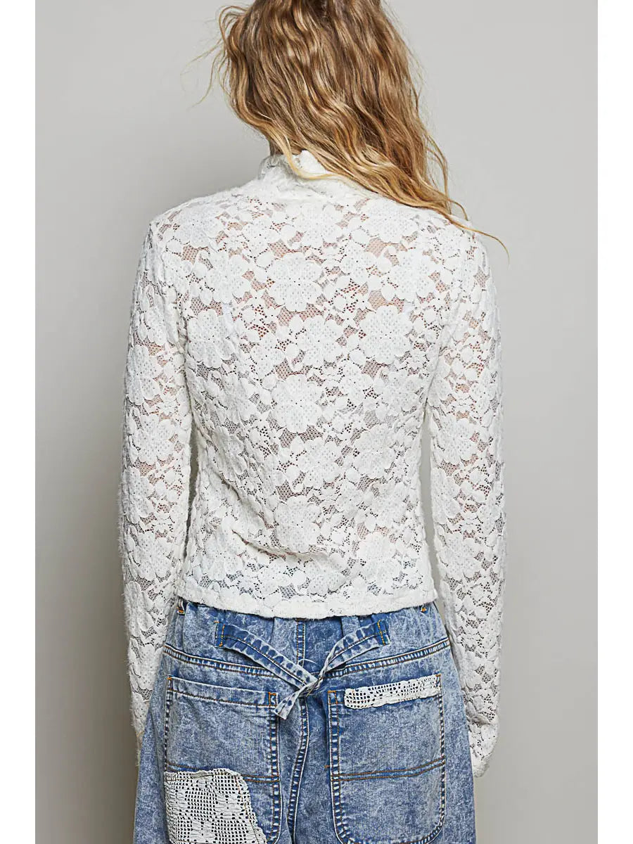 back view — sheer lace back and fitted silhouette