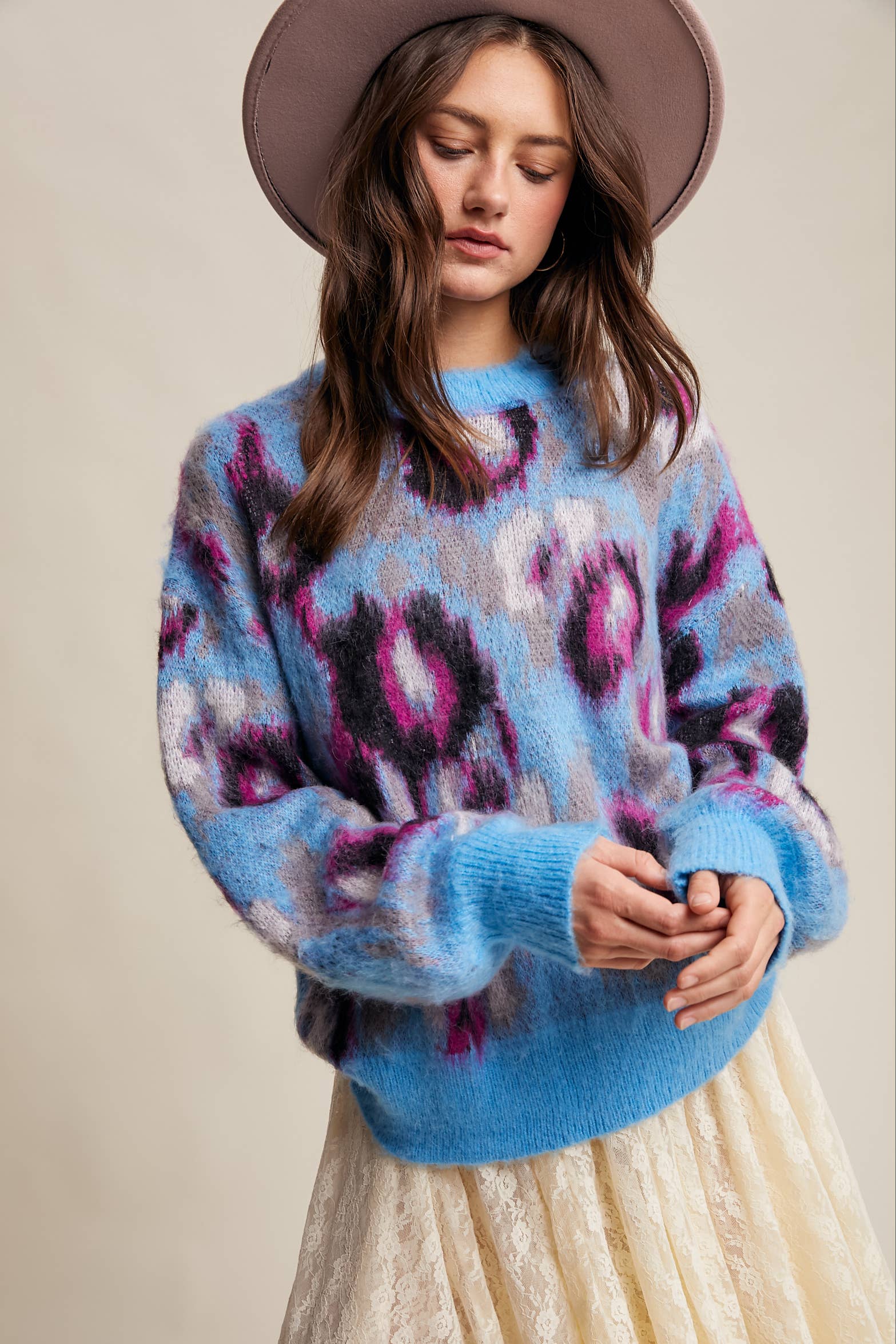 Close Up Women’s fuzzy abstract leopard knit pullover sweater with soft textured fabric and bold animal print — cozy statement top for modern chic outfits.