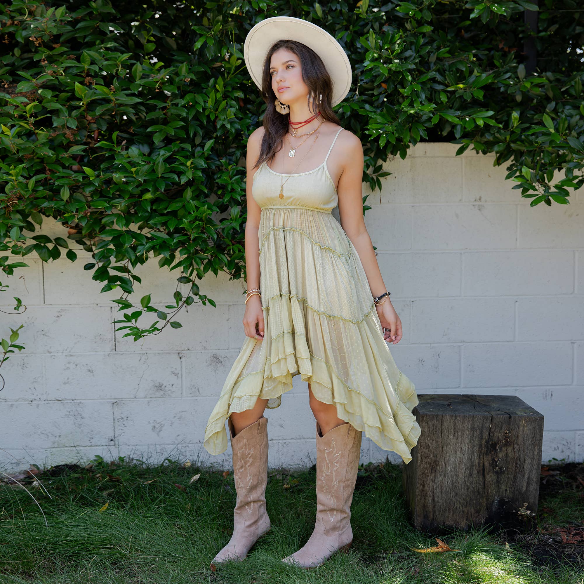 Moss green ruched midi dress detail - artisanal lace inserts and breathable cotton construction