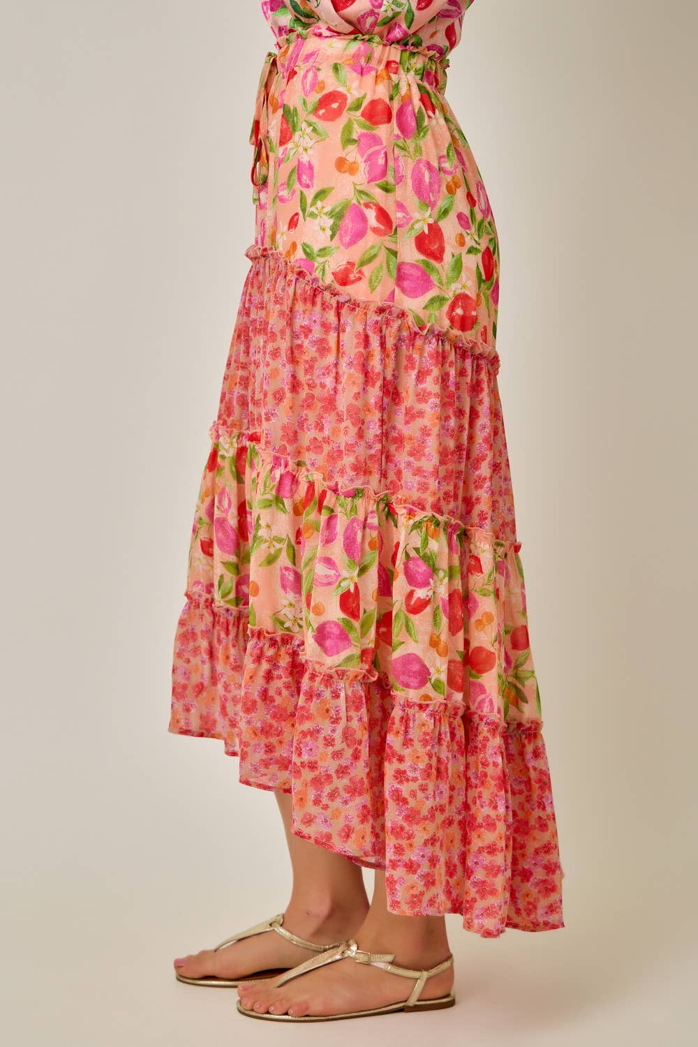 Floral tiered dress on a plain background