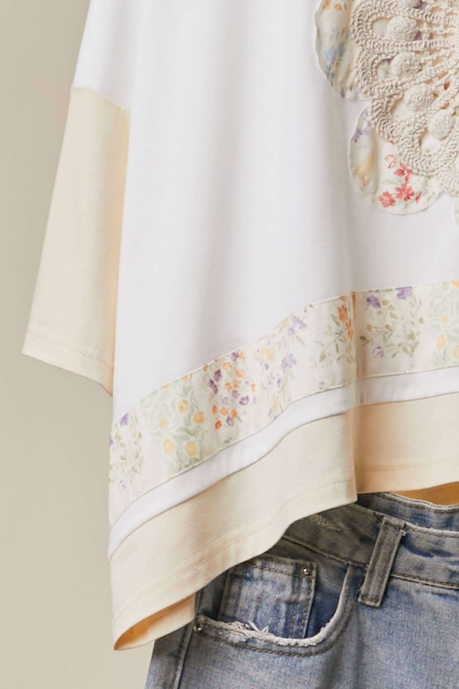 Romantic embroidered top side angle - classic round neckline with delicate lace accents and flattering silhouette

