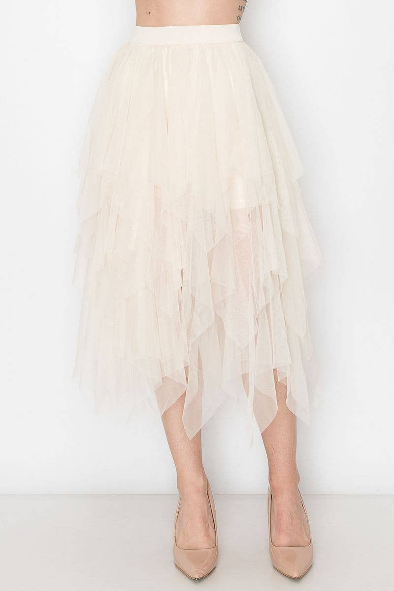 Beige sheer skirt worn by a person on a white background