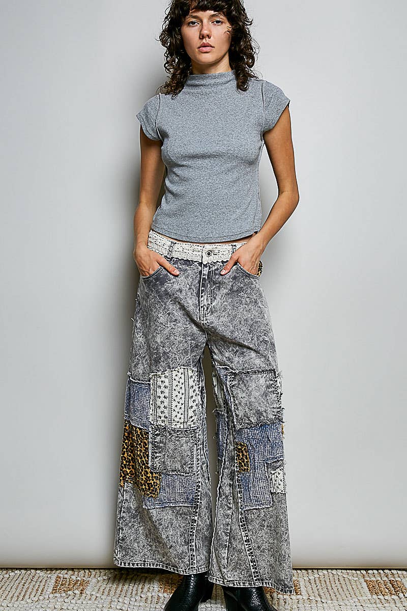 Heather grey vintage wash mock neck rib knit top, full-length front view styled with acid wash patchwork wide-leg jeans