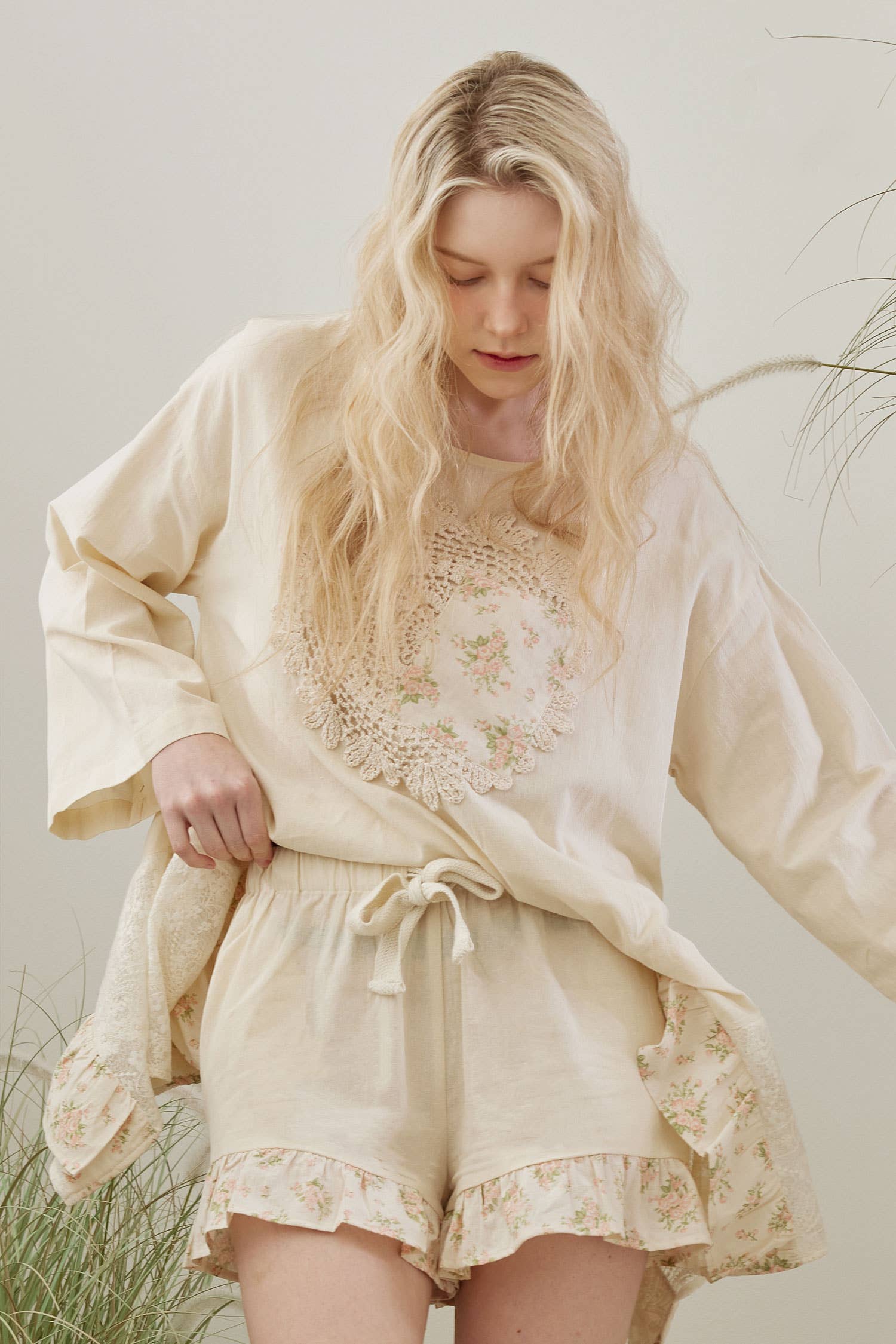 Wildflower Dreams frilled patchwork shorts - front view showing artisanal floral embroidery and romantic frilled edges