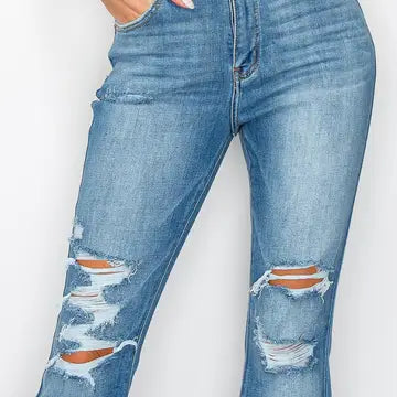 Close-up — medium-wash high-rise distressed jeans with ripped knees and thighs, 5-pocket style, front view.