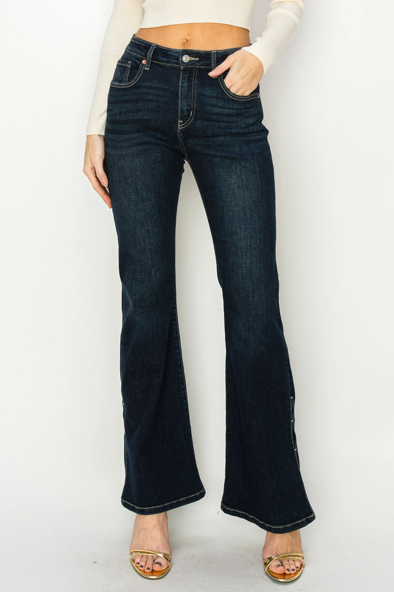 Artemis Vintage Shadow Canyon Flare jeans, high-rise dark-wash denim with flared leg and ankle zip slit, front view.