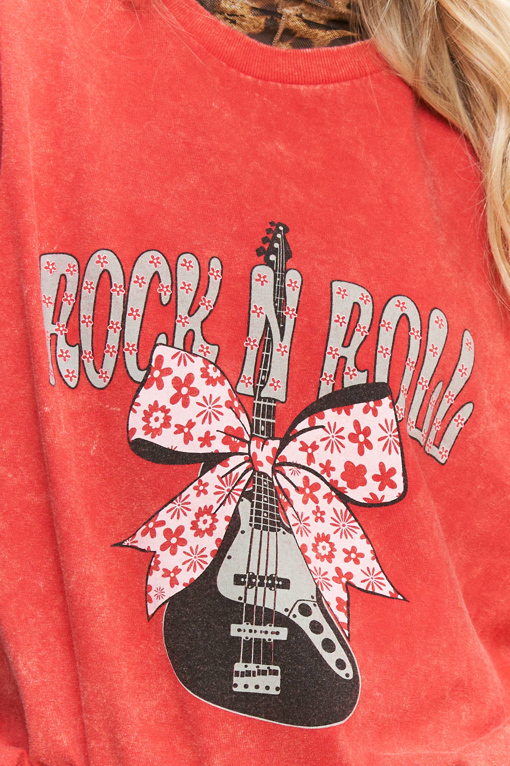 Red shirt with 'Rock N Roll' design featuring a guitar and bow on a red background