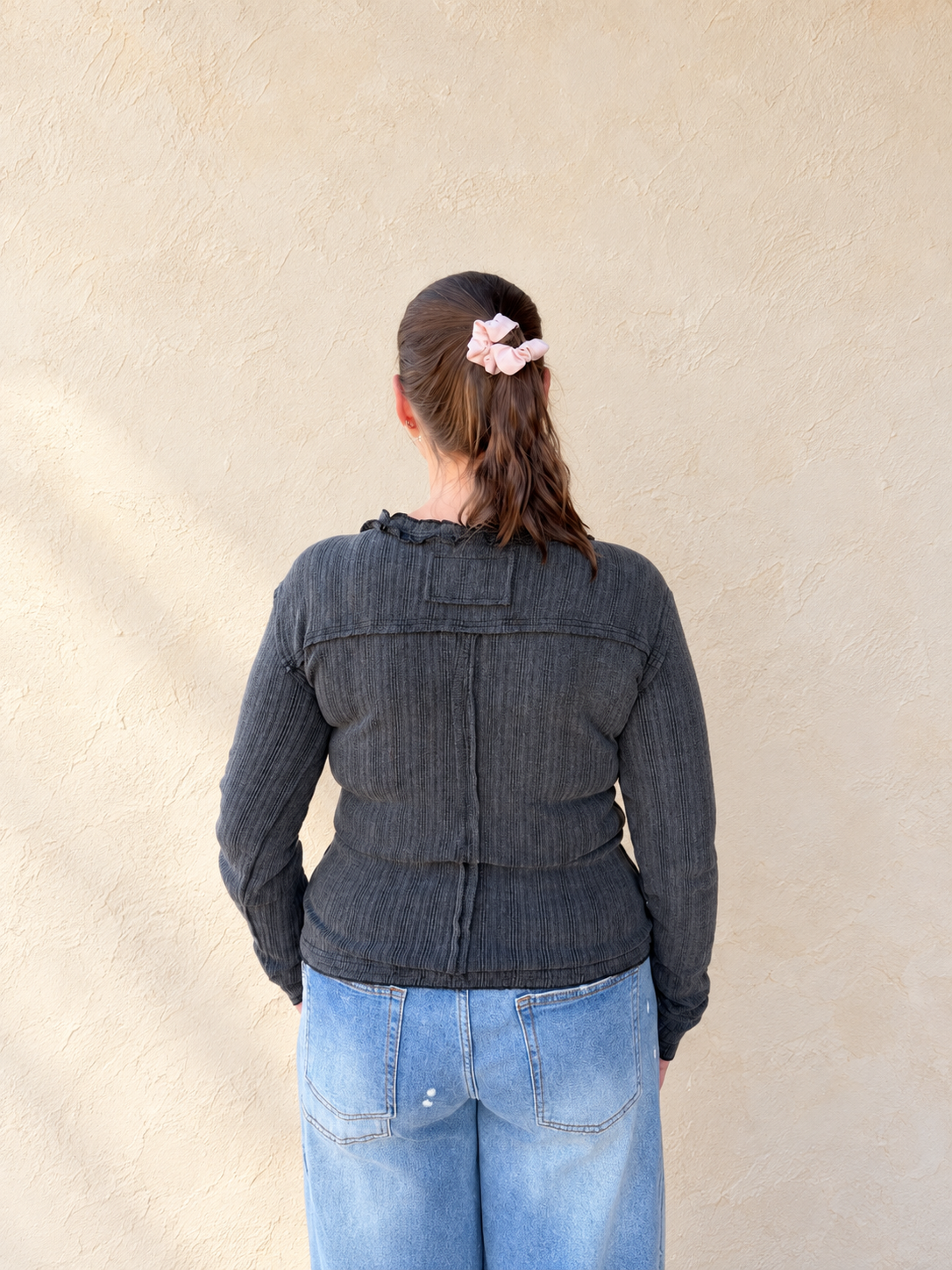 Black Pointelle Ruffle Sweater