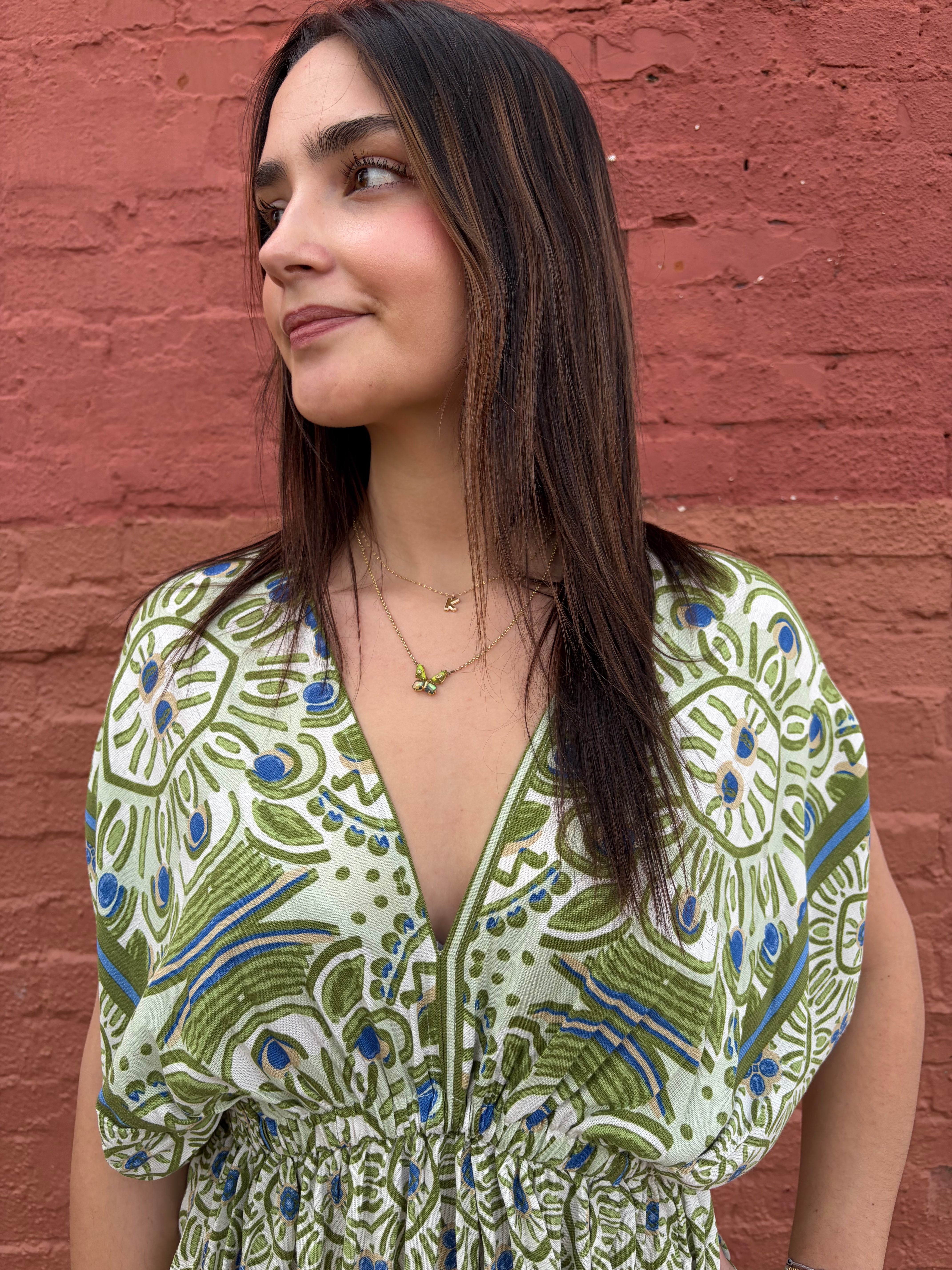 Close up of model wearing the Green Haydee Mini Dress