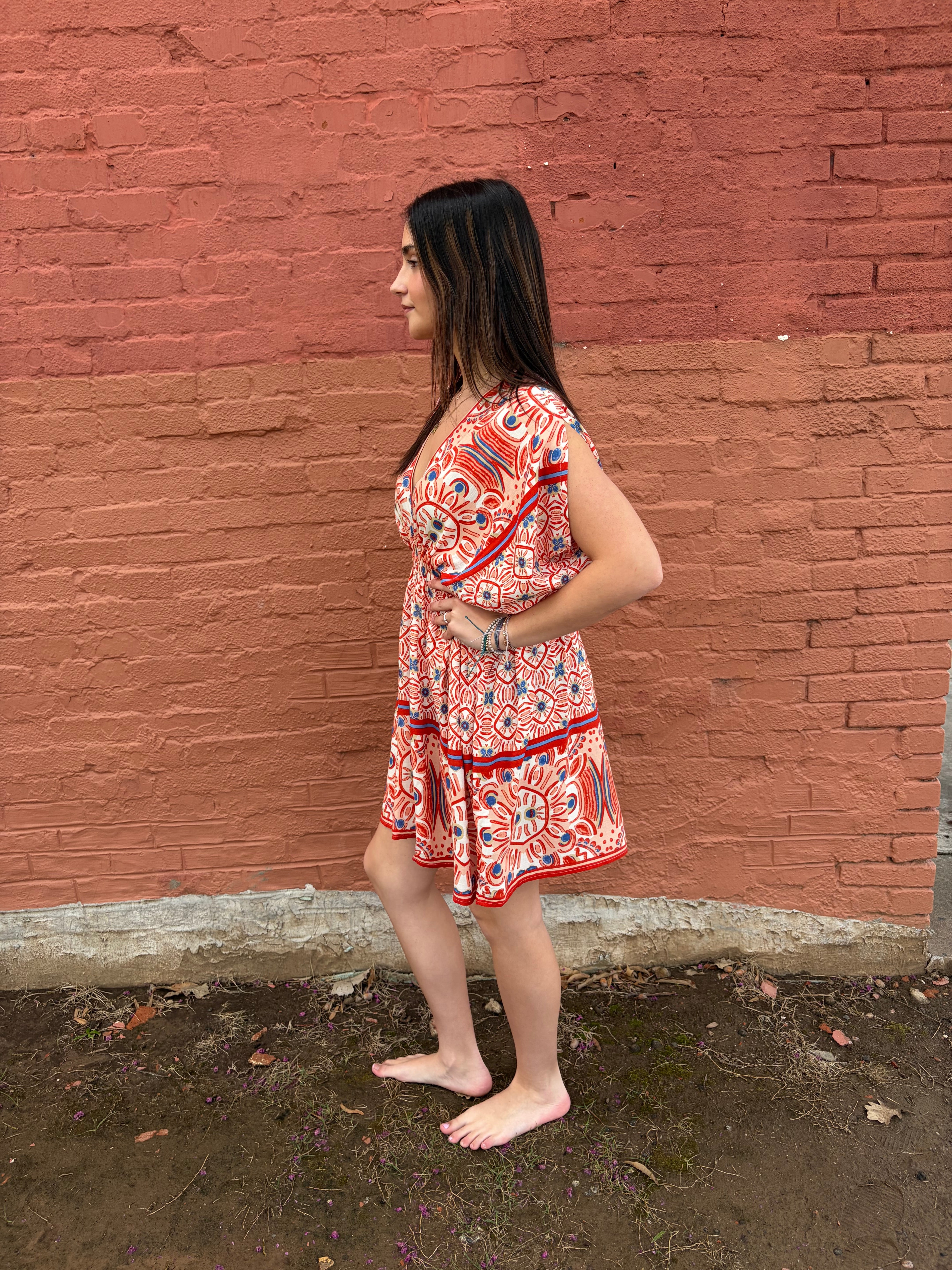 Side view of model wearing the red pattern Haydee Mini Dress