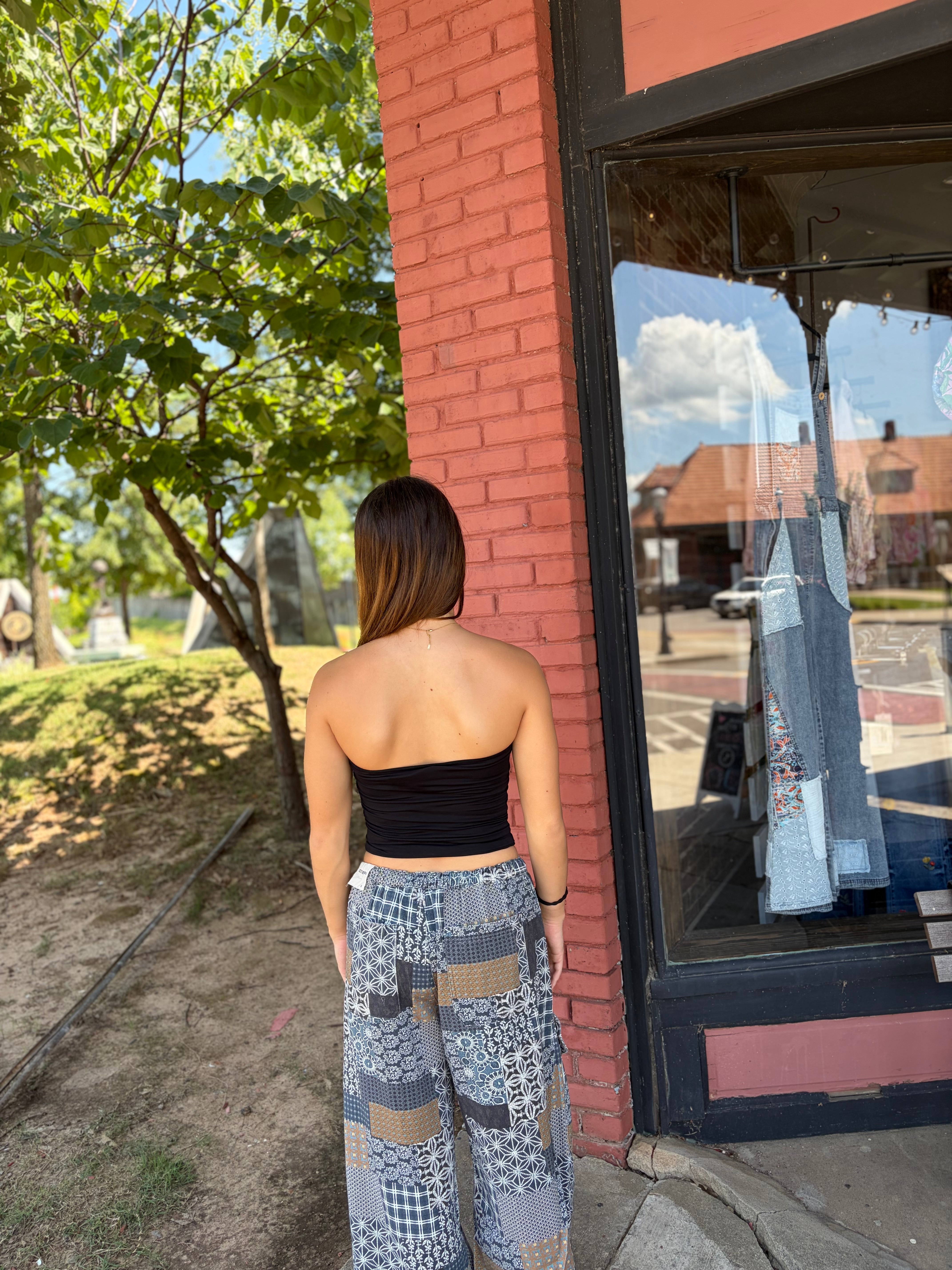 Patchwork print barrel leg cargo pants back view – relaxed fit