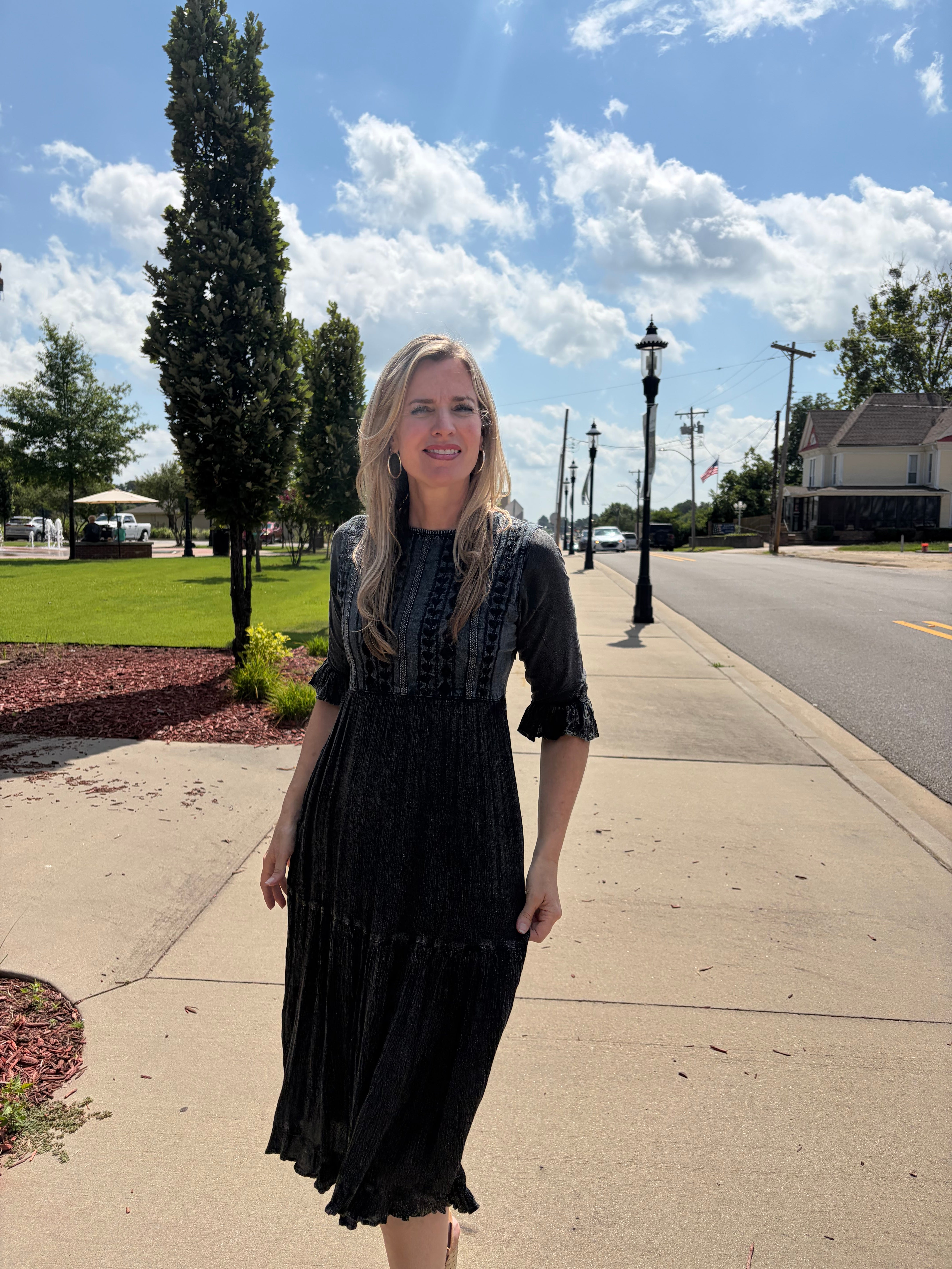 Charcoal stonewashed tiered midi dress with lace-trimmed denim yoke and ruffle bell sleeves 